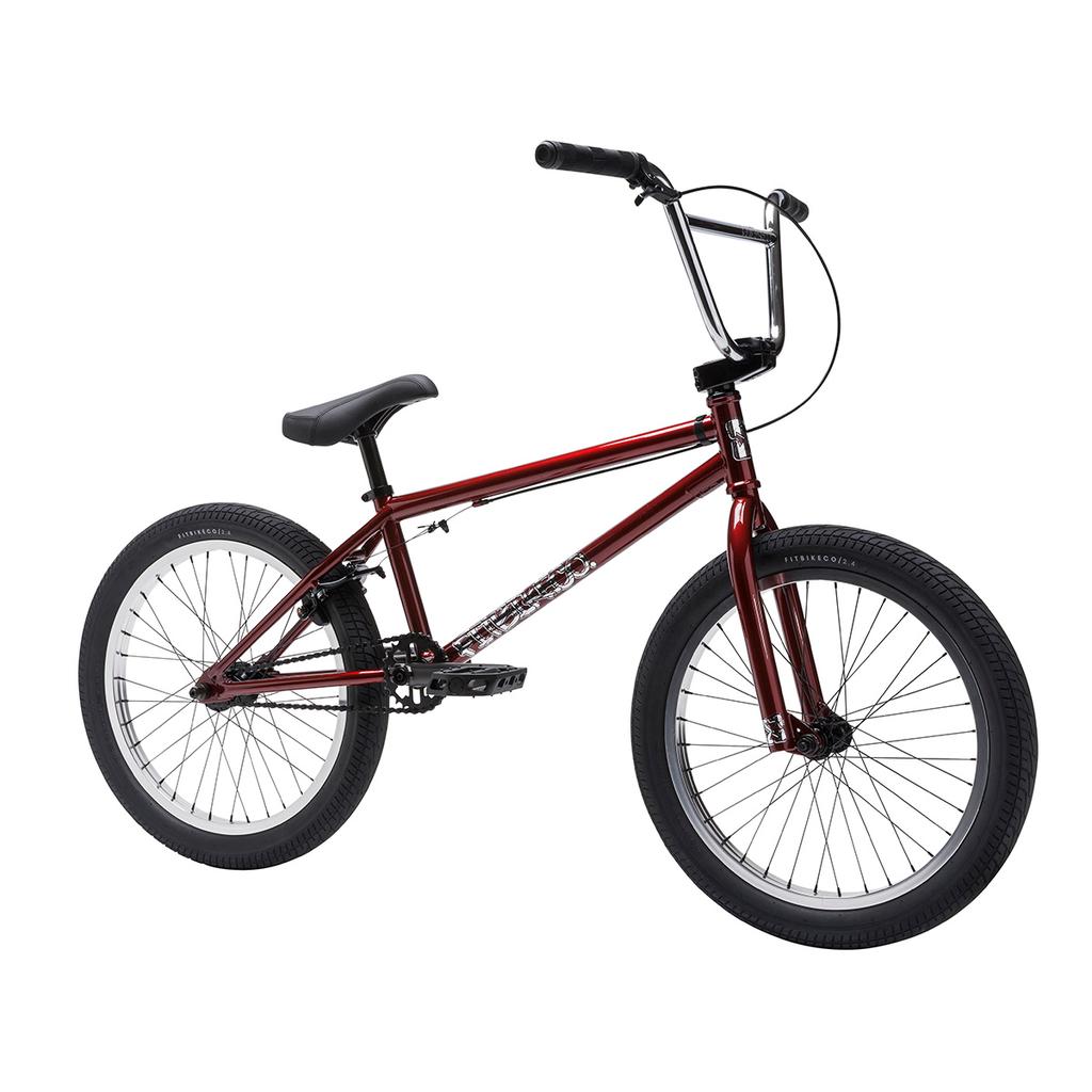 The Fit Bike Co Series One Bike is red with black handlebars, seat, and tires, displayed from a side view on a white background.