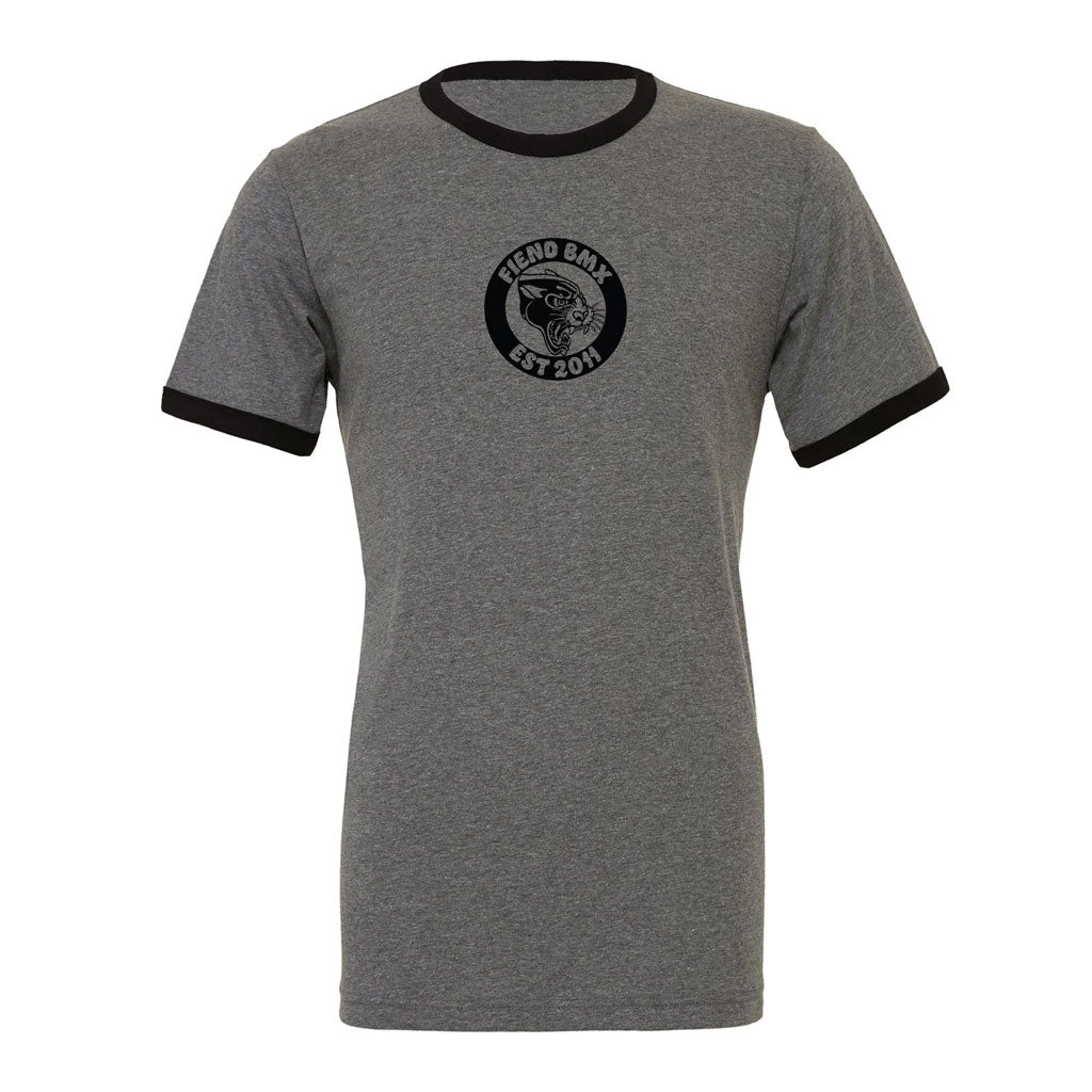 The Fiend 10 Year Shirt is a gray t-shirt with a black collar and cuffs, made from ringspun cotton. It features a circular "Fiend BMX Est 2011" logo on the chest, celebrating a decade of style.