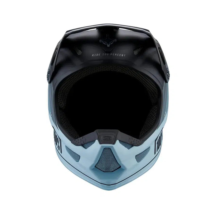 Front view of a black and blue full-face motorcycle helmet with the text "Ride 100 Percent" on the inside of the chin guard. This 100% Status Helmet Decline Grey offers robust full-face protection, perfect for youth BMX enthusiasts.