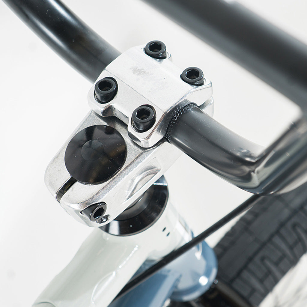 A close up of a Division Reark 20 inch Bike handlebar.