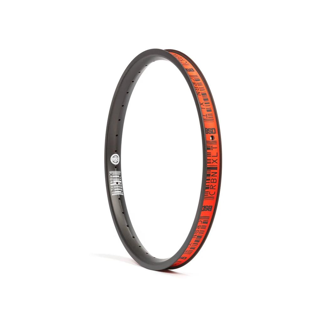 A black 20-inch BSD Crbn-xlt 20 Inch Rim with orange brand graphics along the outer edge.