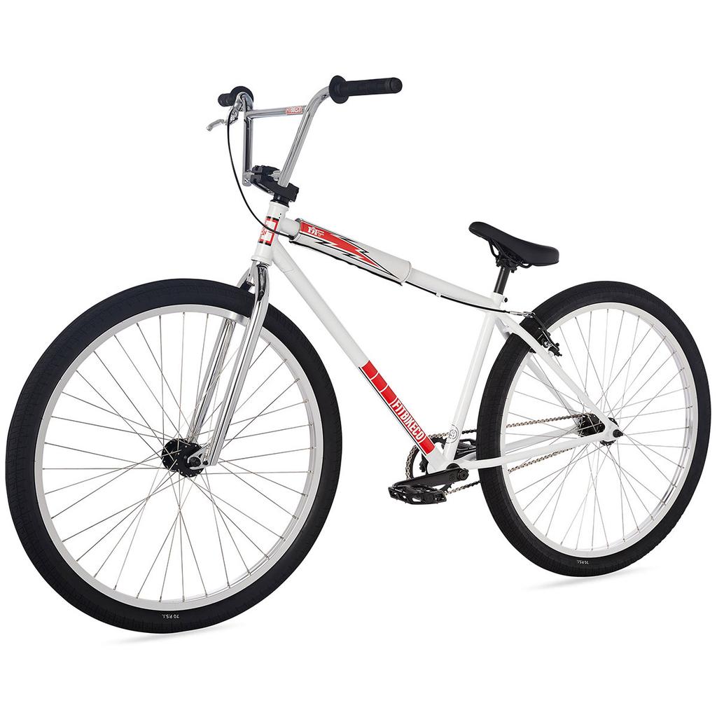 The Fit CR29 Inch Bike (2023) is a white 29-inch BMX cruiser with black handlebars, seat, and tires. Modern design meets classic BMX style, shown here from a slight angle.