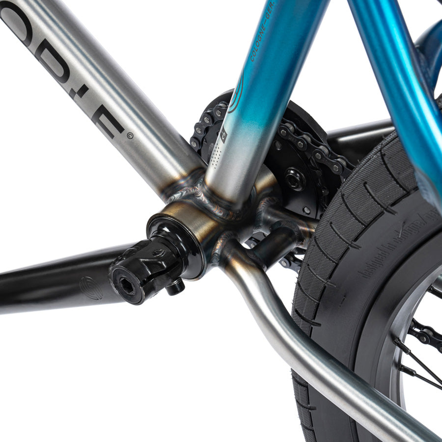 A close up of a Wethepeople Reason 20 Inch BMX Bike with a black handlebar, designed for urban warriors who seek the thrill of riding on the streets.
