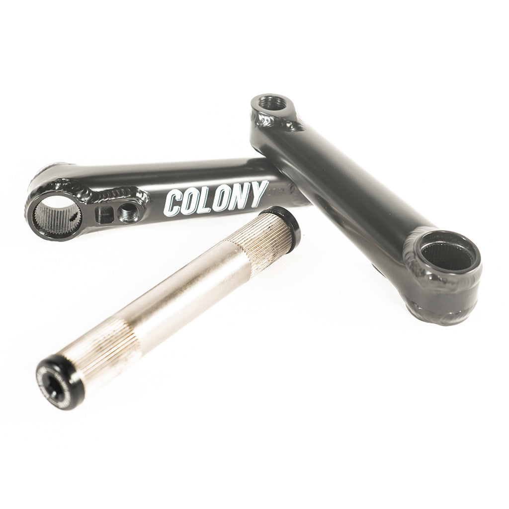 A lightweight pair of Colony Venator 127mm Cranks (Suit 16" Wheeled Bikes) in black and silver, featuring the word "colony" on them.