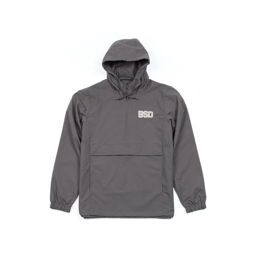 The BSD Athletic 91 Windbreaker Jacket is a gray nylon, water-resistant, hooded pullover with a front pocket and "BSD" logo on the left chest, offering lightweight comfort for any weather.