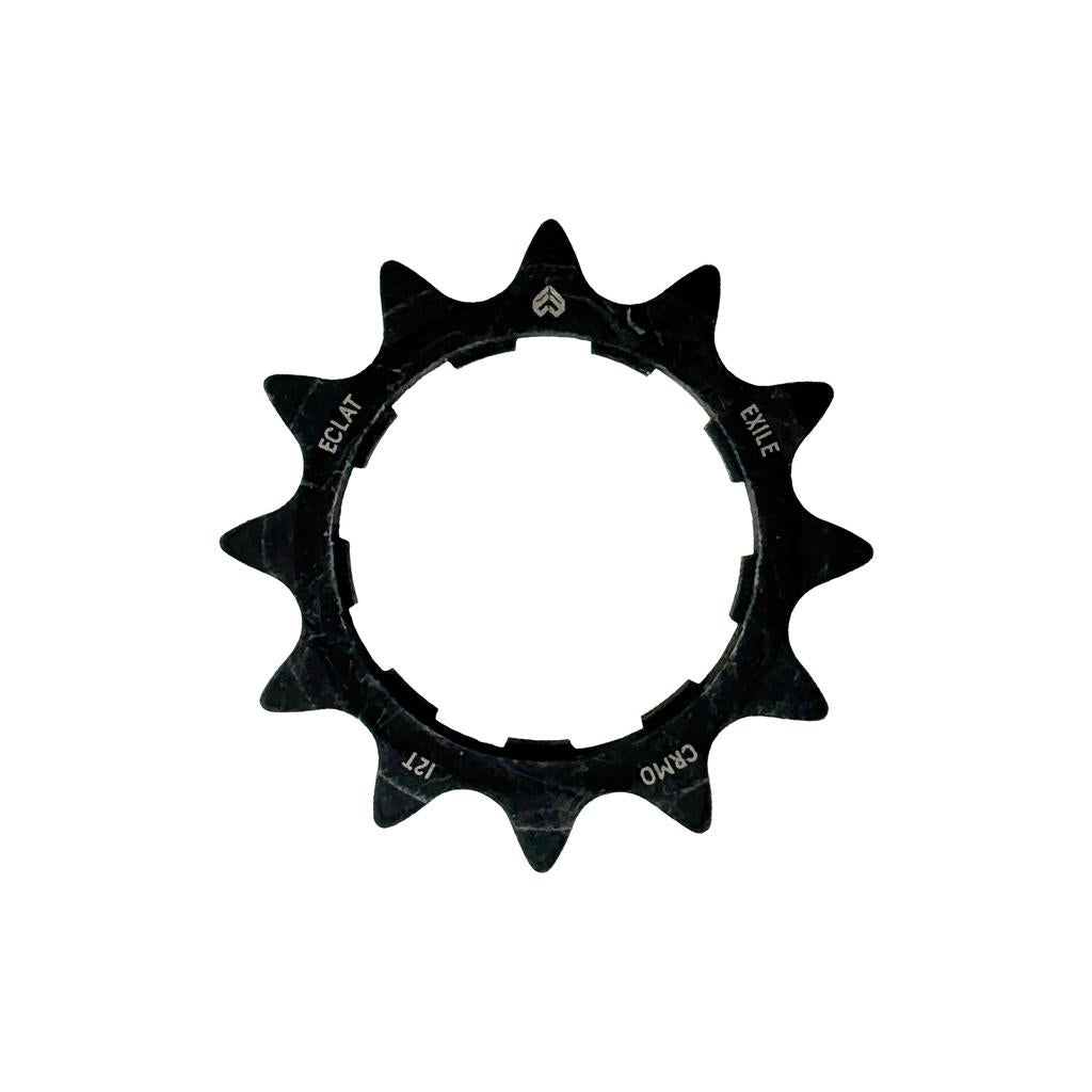 The Eclat Exile Chromo Cassette Rear Sprocket, a black metal BMX cog with 17 teeth, is shown isolated on white. It features "Eclat", "Exile", "17T", and "CNC" engravings, compatible with Shimano HG-style and Exile Cassette hubs.