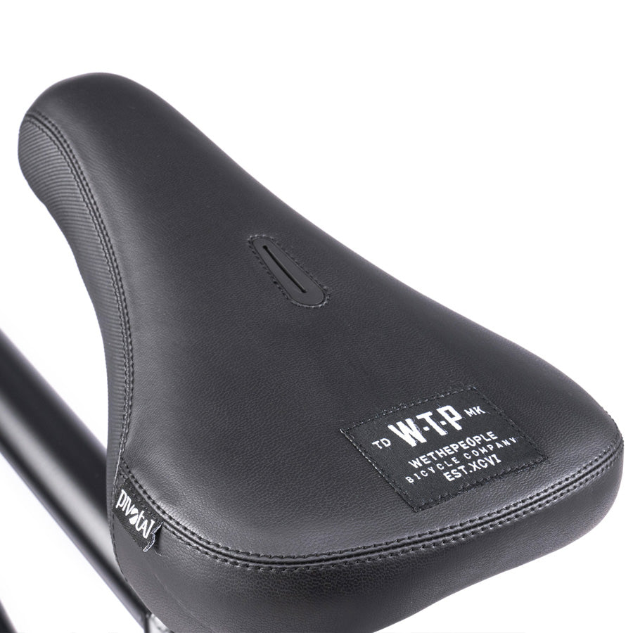 A close up of a black bicycle saddle featuring the Wethepeople Trust 20 Inch Cassette Bike.