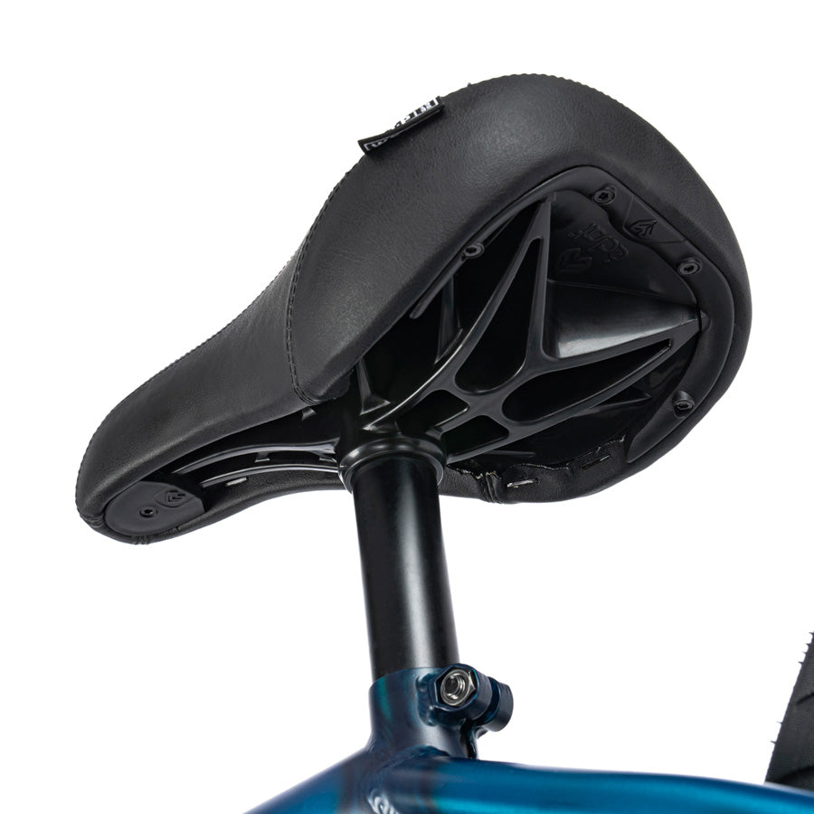 A close up of the seat of a Wethepeople Reason 20 Inch BMX Bike in blue.
