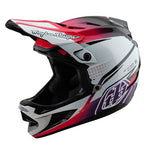 The TLD 25.1 D4 Carbon Helmet (MIPS) / Drip White is a full-face motocross helmet, perfect for downhill BMX adventures. It features a visor, air vents, and a striking red, white, and black design with a bold side logo for enhanced style and performance.