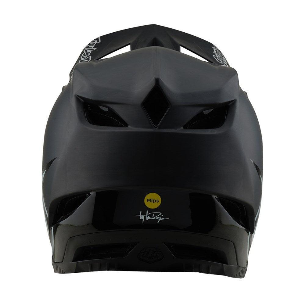 Rear view of the TLD 25.2 D4 CARBON HELMET MIPS STEALTH BLACK, a matte black full-face helmet with a yellow Mips logo and white signature on the lower back—ideal for downhill mountain biking.