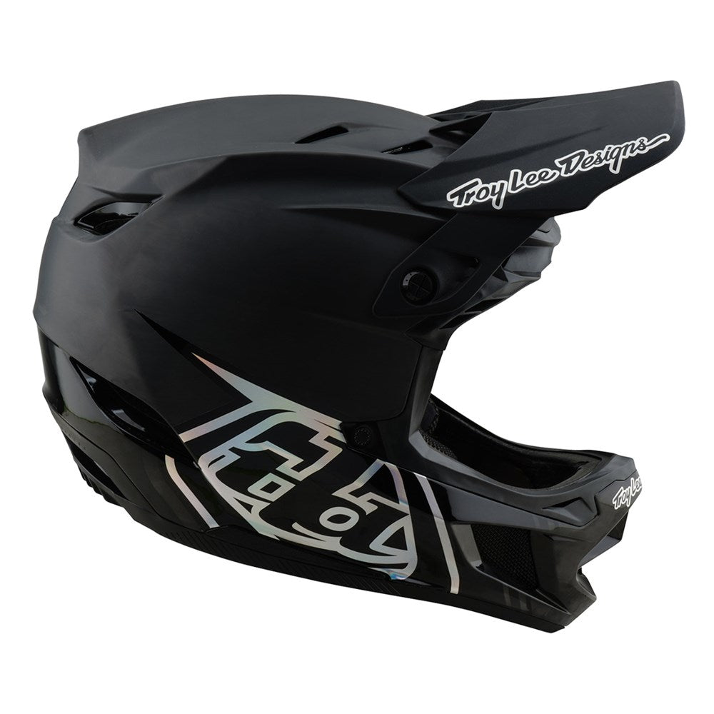 The TLD 25.2 D4 Carbon Helmet MIPS Stealth Black is a full-face motocross helmet with Mips protection and Troy Lee Designs branding—perfect for downhill mountain biking.