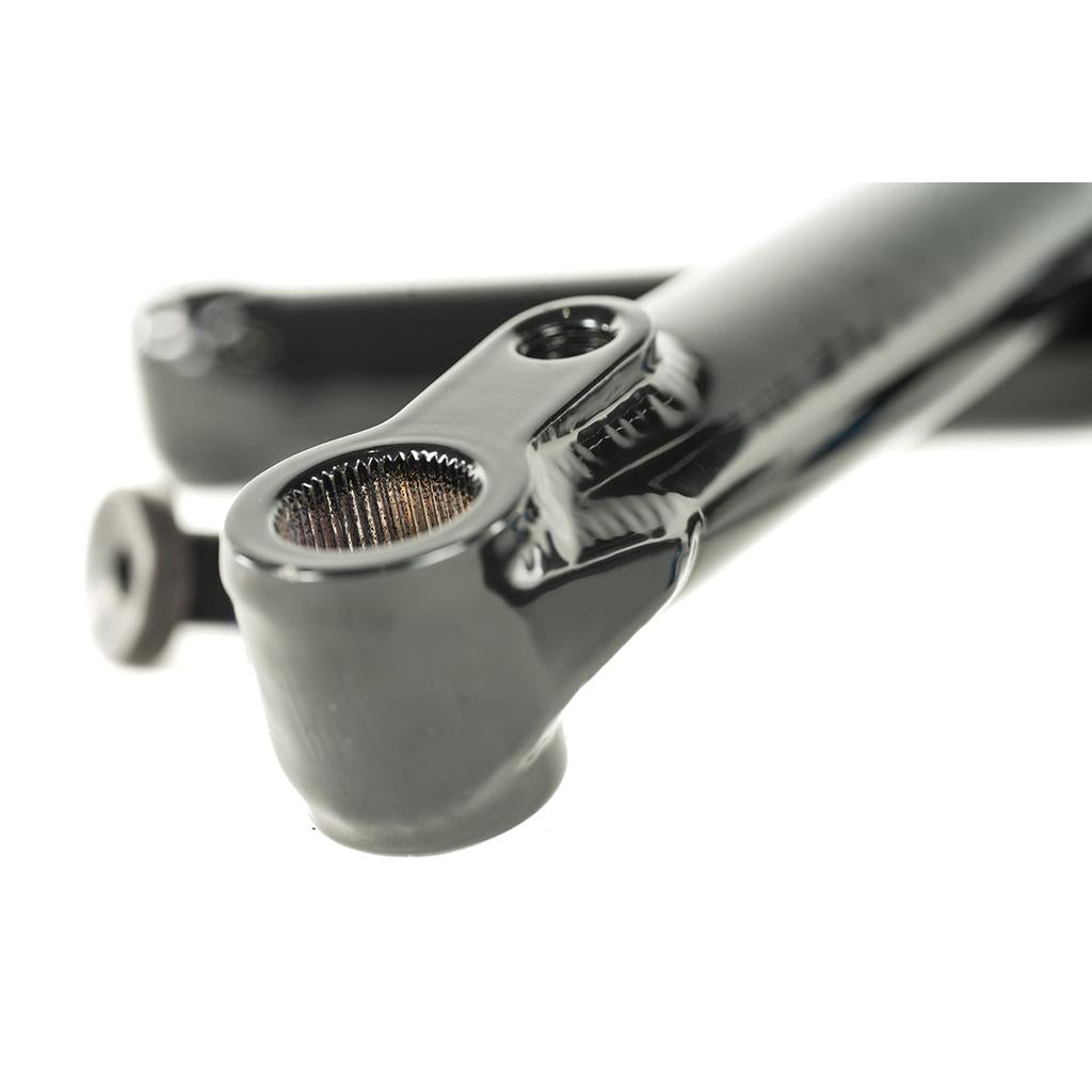 Close-up of a black bicycle fork dropout with a threaded hole and glossy metal surface—perfect for setups using Cult Crew Cranks with 19mm spindles or chromoly arms.