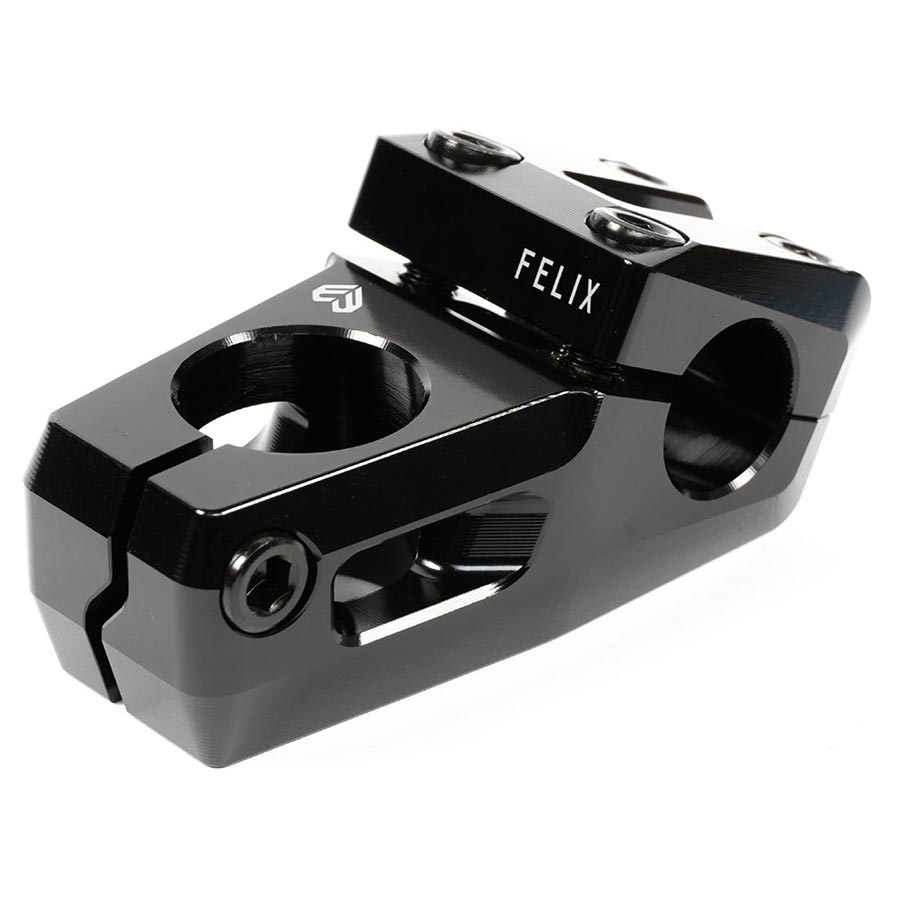 The Eclat Felix Top Load Stem (22.2mm Clamp) is a black BMX stem with "FELIX" engraved on top, features a Vice-Jaw clamping system, and includes three bolt holes for handlebar attachment as part of the Felix Prangenberg signature design.
