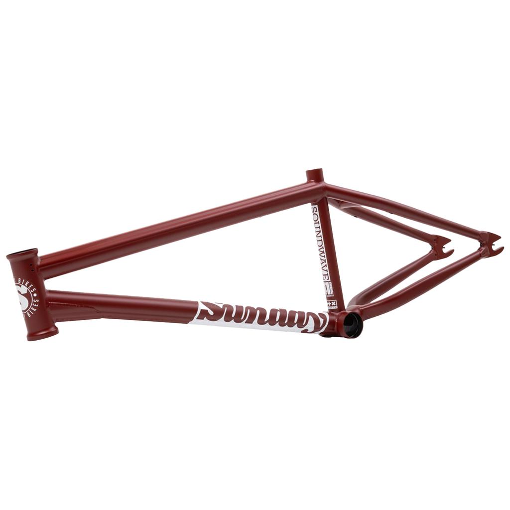 A maroon Sunday Soundwave V3 Frame BMX with white branding, shown from an angle highlighting the rear triangle and head tube. Made of 4130 Chromoly and backed by a 41-Thermal Lifetime Warranty for lasting strength.