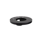 The Alienation Circle Jerks Chain Tensioner (14mm) is a round, black 6061-T6 alloy metal disc with a central hole and "14 1.5-2" engraved on its surface.