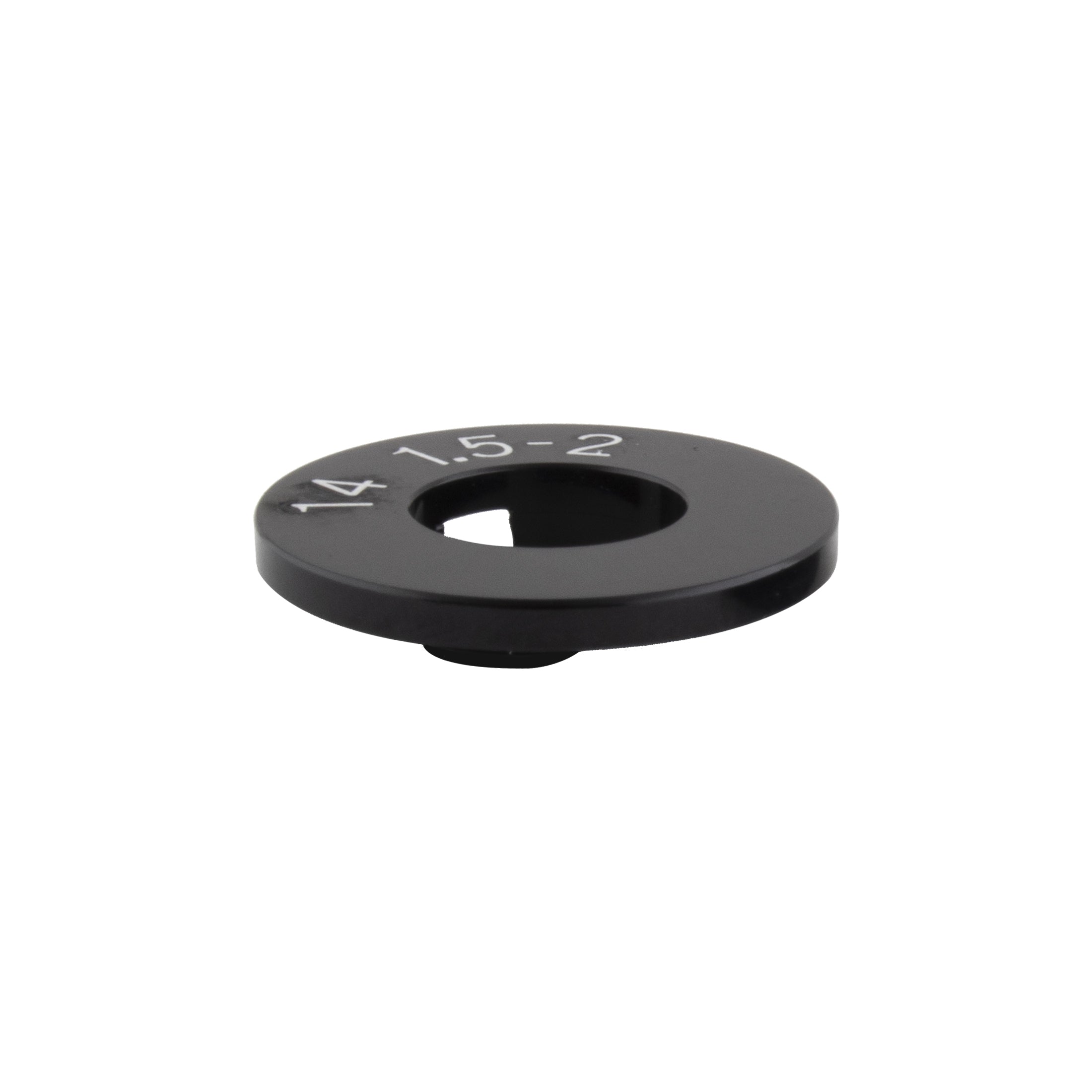 The Alienation Circle Jerks Chain Tensioner (14mm) is a round, black 6061-T6 alloy metal disc with a central hole and "14 1.5-2" engraved on its surface.