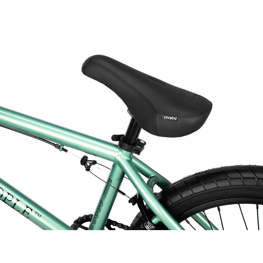 Close-up of the frame and seat of a light green Wethepeople Arcade 20 Inch Bike.