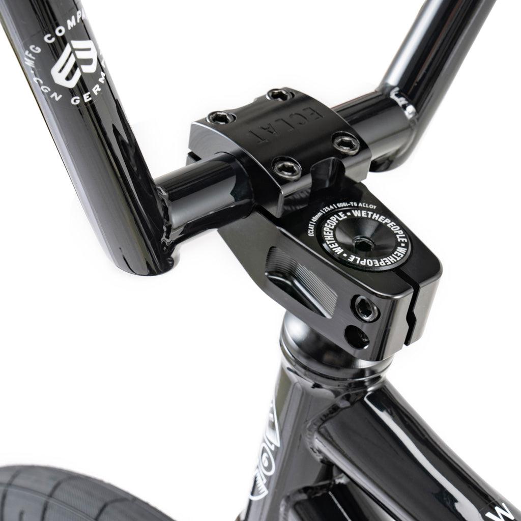 A close up of a black Wethepeople Battleship 20 Inch BMX Bike with hydro formed gussets and a handlebar.