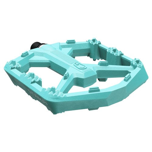 The Crank Brothers Stamp 0 Pedals (Small) are turquoise, flat, and feature a composite body with a textured surface and raised grips for superior traction, shown from an angled side view on a white background.