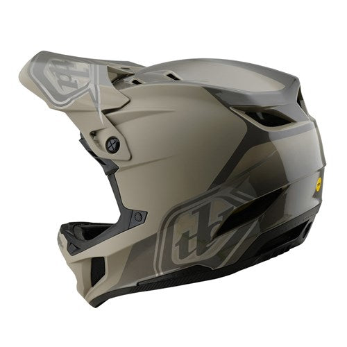 The TLD D4 Polyacrylite Helmet (MIPS) / Shadow Timber is a matte-finish, full-face motorcycle helmet with a polyacrylite shell, angular gray and black design, a prominent visor, MIPS brain protection technology, and a sleek side logo.