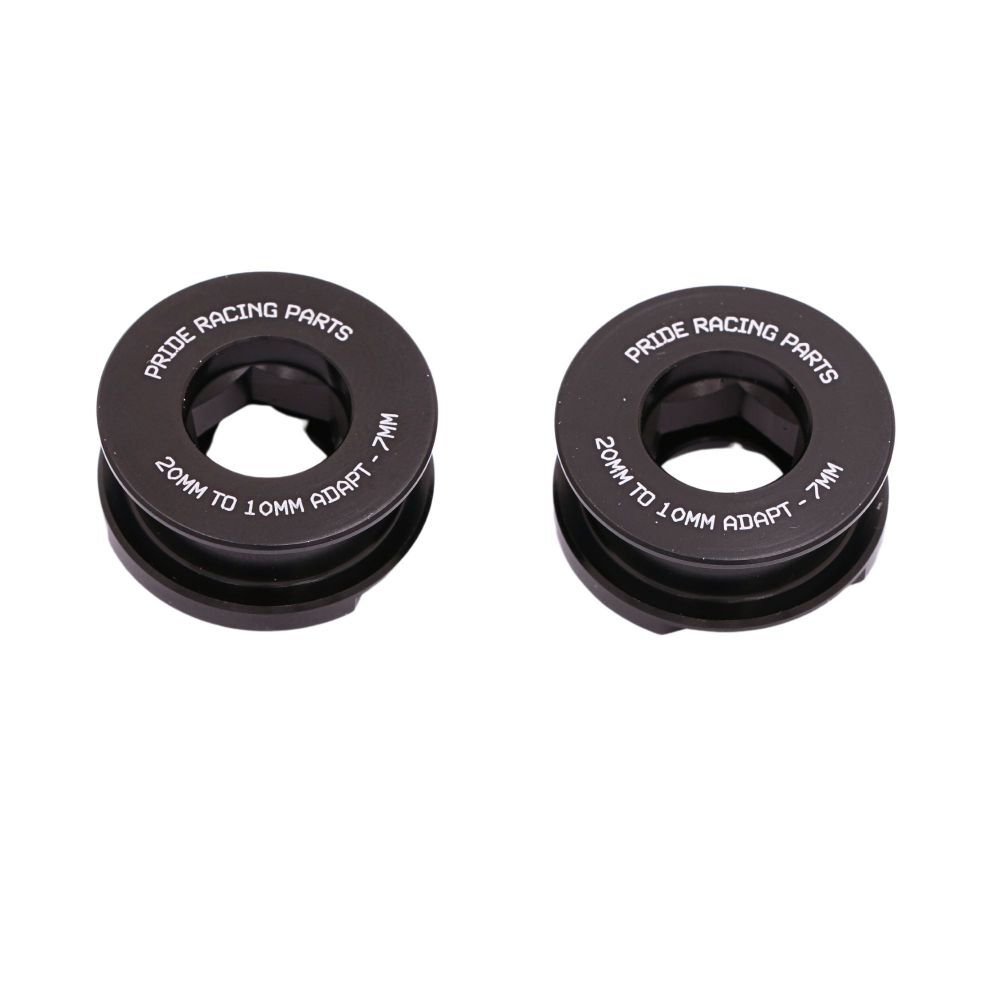 Two black circular Pride 20/10mm Fork Adaptors are shown on a white background—ideal for converting 20mm to 10mm fork axles or adding to your CNC-machined adapter kit.