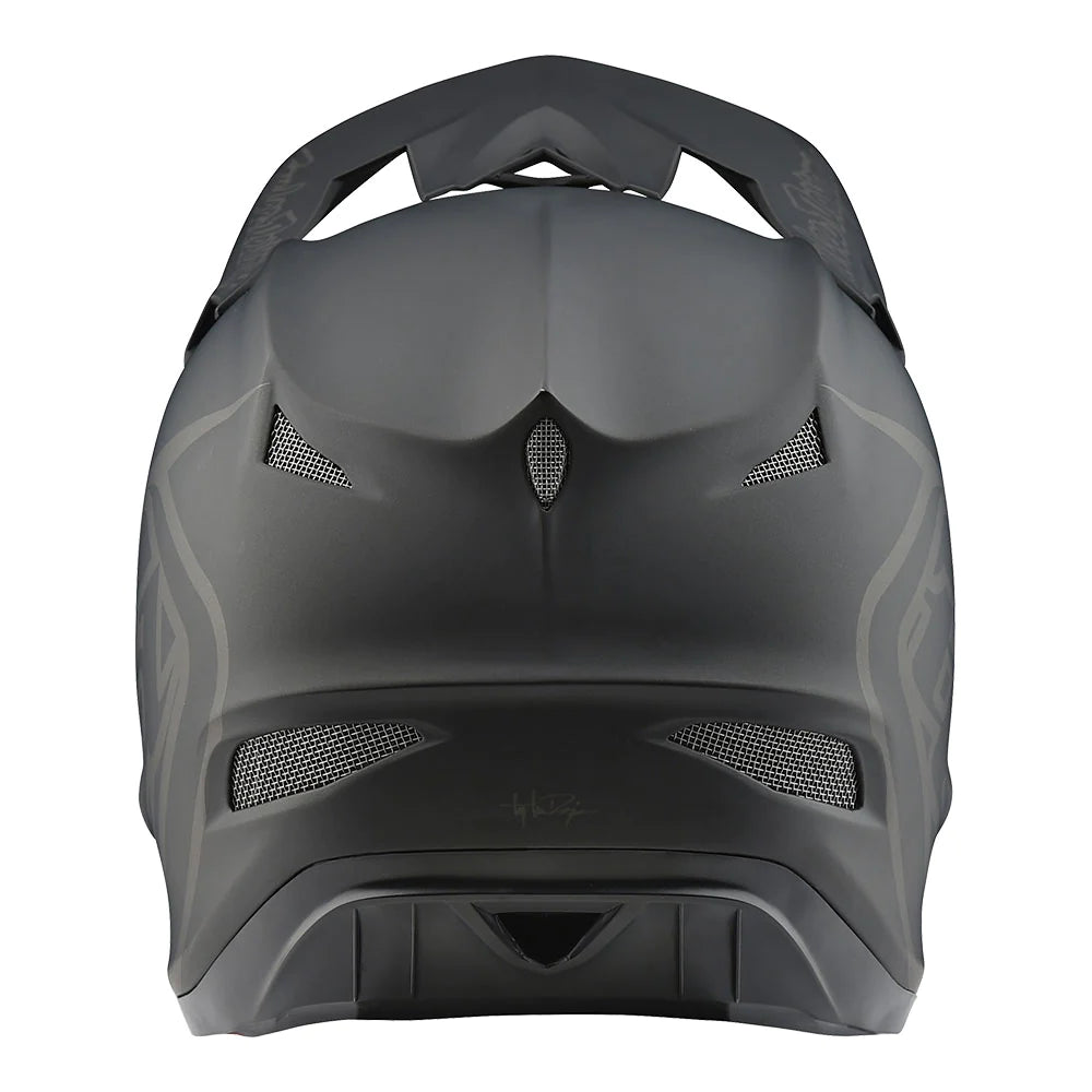 A lightweight composite design helmet, the TLD 22S D3 AS Fiberlite Helmet Mono Black, displayed on a white background.