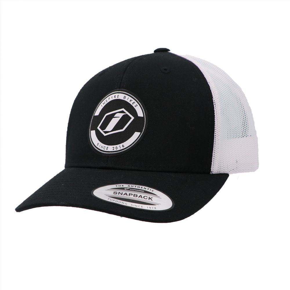 The Inspyre Trucker Cap is a black and white mesh hat with a round front logo and “SNAPBACK” sticker, ideal for fans of stylish trucker caps.