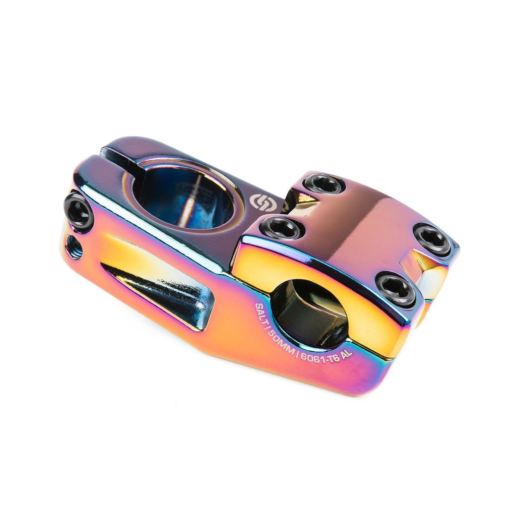 The Salt Pro V2 Top Load Stem is a rainbow-anodized 6061-T6 aluminum stem with six black bolts, "Salt 50MM" labeling, and a wider clamping area for increased strength and secure Stc clamping.