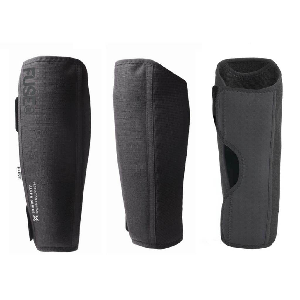 Three views of the Fuse Alpha Classic Shin Pads (Pair) highlight pedal bite protection, with side, front, and inner padding details visible against a white background.