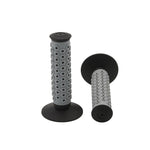 Upgrade your bike with Redline Two Piece Grips—gray and black, featuring circular textured patterns. Includes two grips: one upright, one on its side.