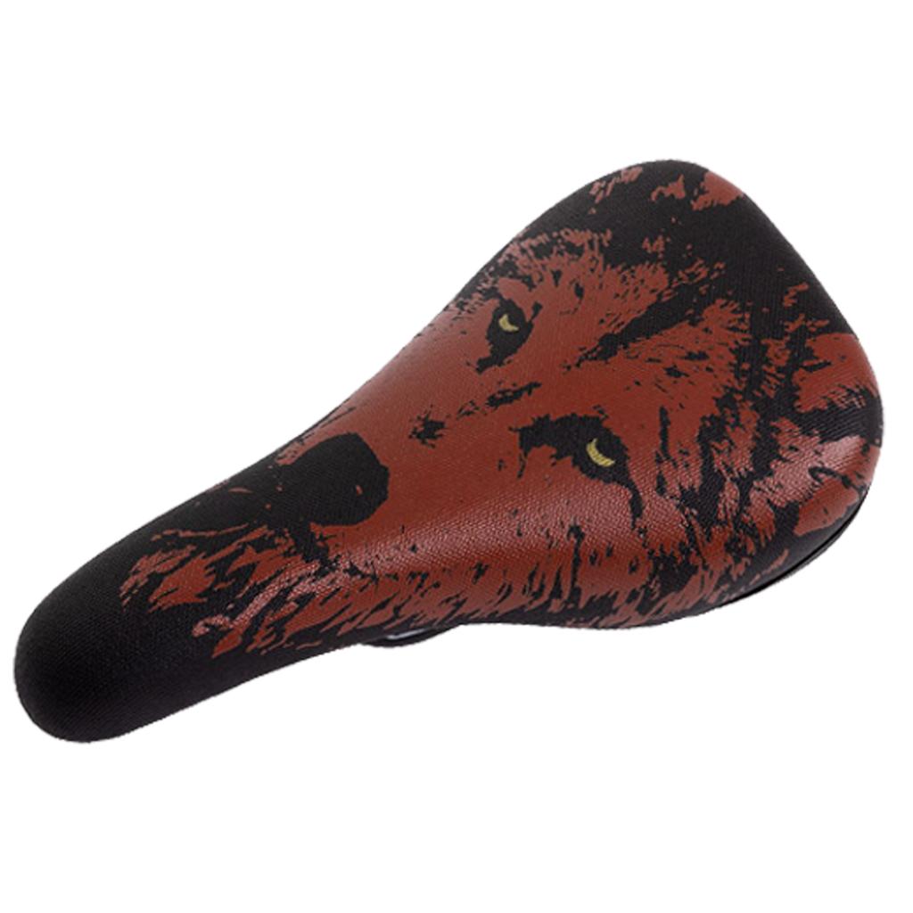 The Odyssey Aitken (Mike Aitken) Railed Seat features a striking graphic of a wolf's face in brown, black, and yellow tones—seen from above—making it an ideal choice for BMX riders looking for standout style.