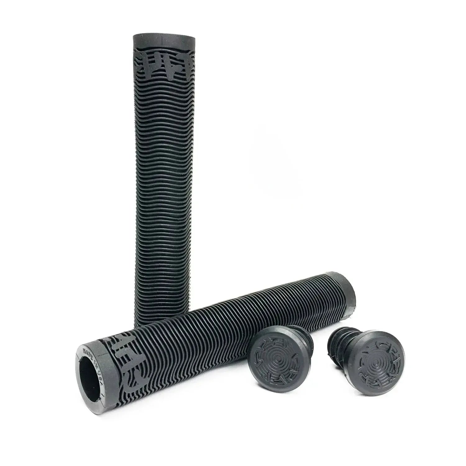 The Cult Solo Grips are black rubber BMX grips with a textured surface, sold as a pair with matching bar end plugs, providing comfort, control, and durability on your ride.