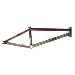 The S&M Black Magic Frame is a two-tone chromoly BMX frame with a brown top tube and metallic gold lower tubes, made from Thermal-X tubing, displayed on a white background.
