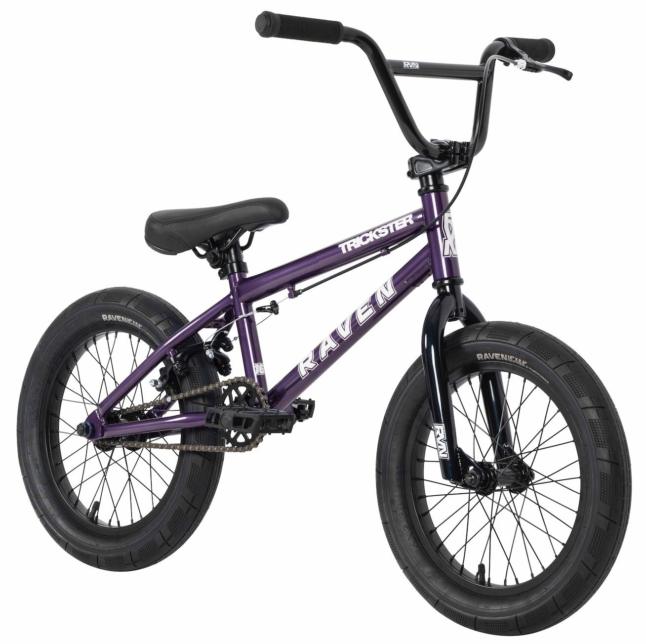The Raven Trickster 16 Inch Bike features a purple frame with "Raven" and "Trackster" branding, black tires, seat, and handlebars, plus durable double-wall rims for extra strength.