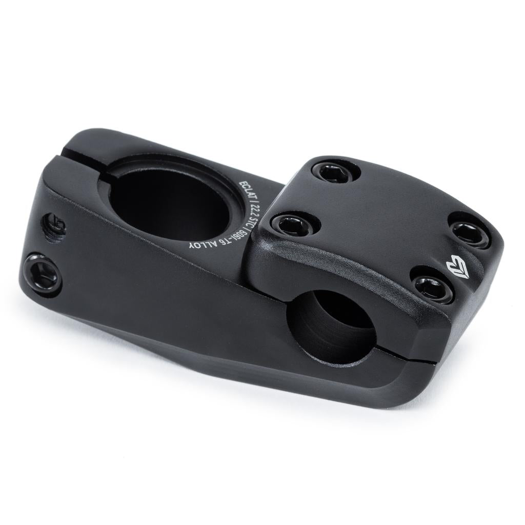 The Eclat Onyx Stem (22.2mm Clamp) is a black aluminum alloy BMX stem with four top bolt holes and two side clamp holes for handlebar and fork attachment, crafted using cold forging technology for enhanced strength.