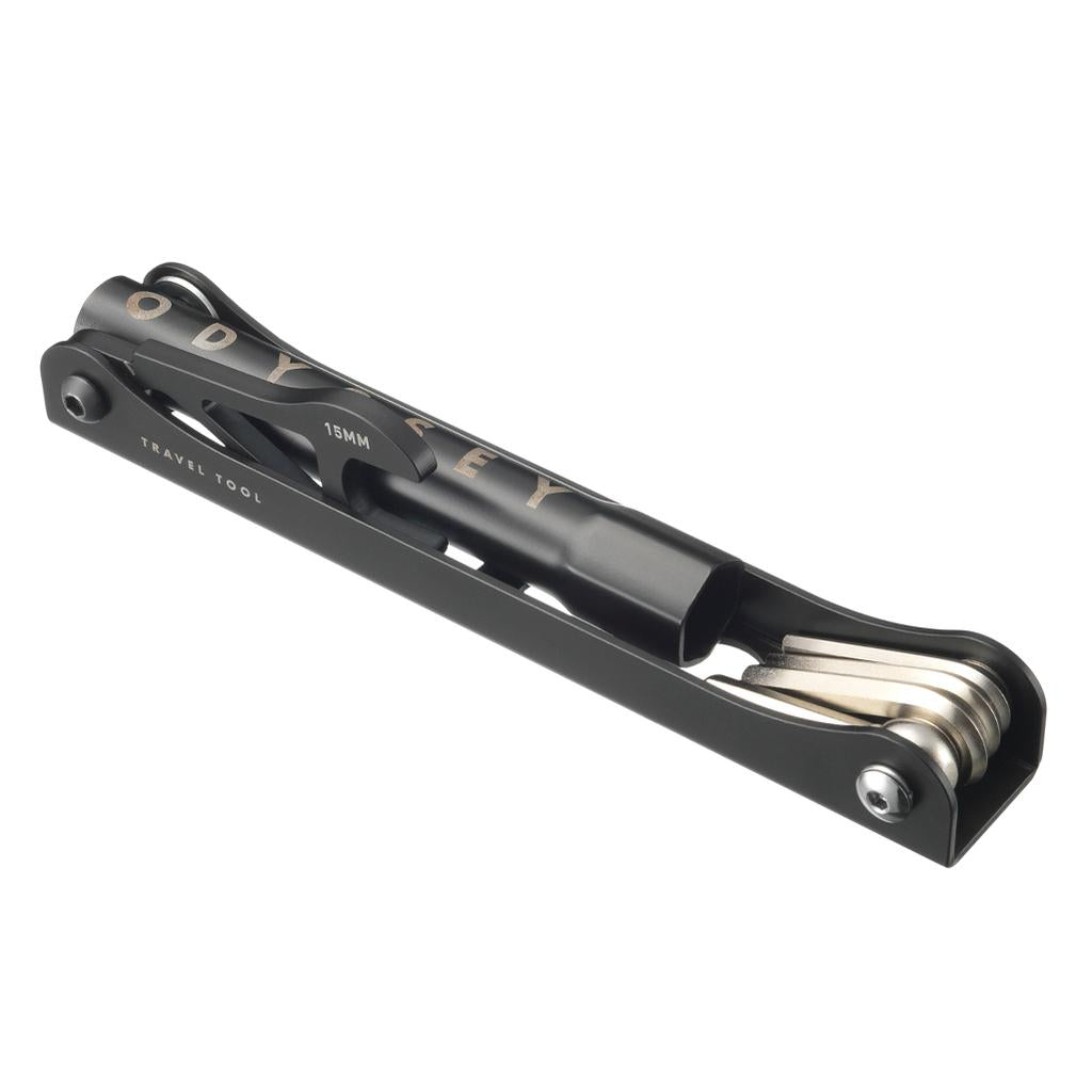 The Odyssey Travel Tool is a compact black bike tool with fold-out metal parts, including allen keys and a 15MM cylindrical section, ideal for travel.