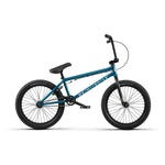 The Wethepeople Arcade 20 Inch Bike is shown in profile on a white background. This blue BMX features black handlebars, seat, and tires, with the "WeThePeople" brand name boldly displayed on the frame.