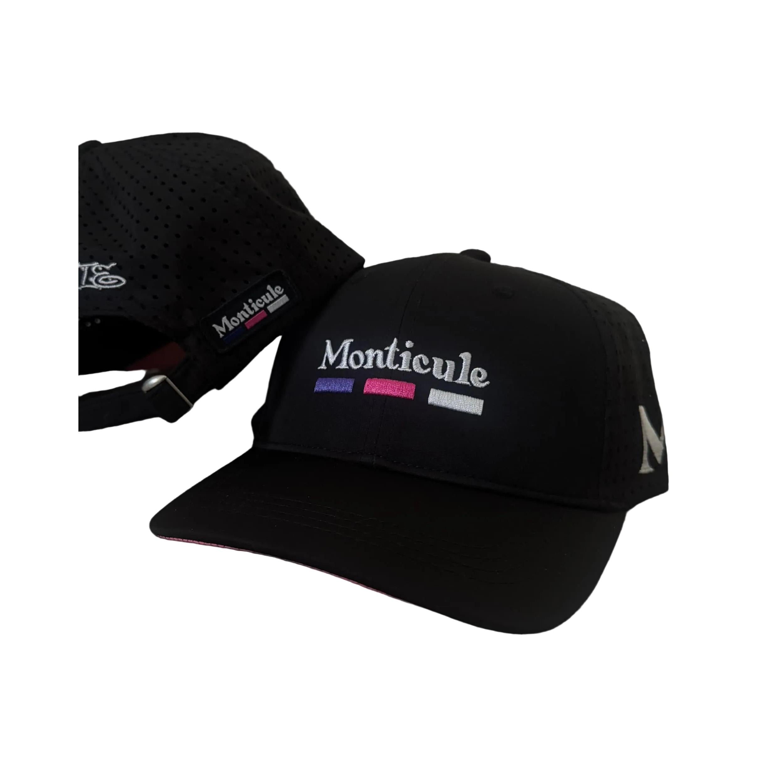 Two black Monticule Vapor Strap Back Hats, featuring "Monticule" embroidered on the front with colored stripes and a breathable mesh back; one hat is shown from the front, the other from the back.
