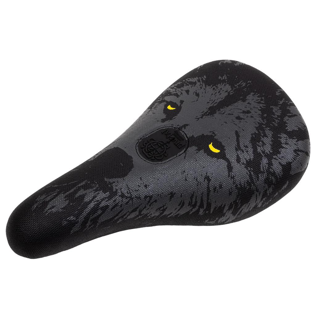The Odyssey Aitken Pivotal Seat showcases a gray wolf face with vivid yellow eyes on top, blending retro style and classic Odyssey seat design inspiration.