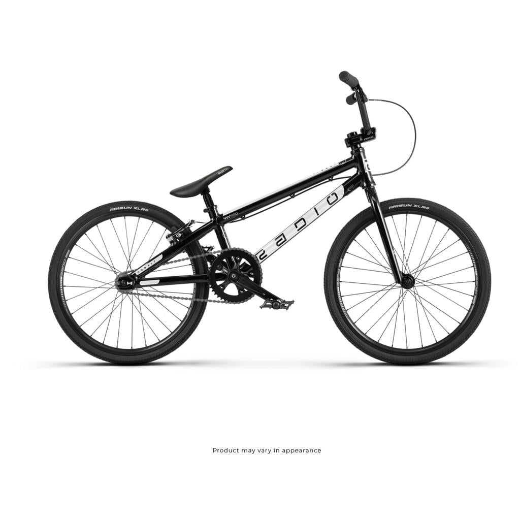 The Radio Cobalt Expert Bike is a black BMX race bike with a lightweight frame, durable tires, straight handlebars, and single-speed gearing—ideal for entry-level racers. Photographed on a white background.