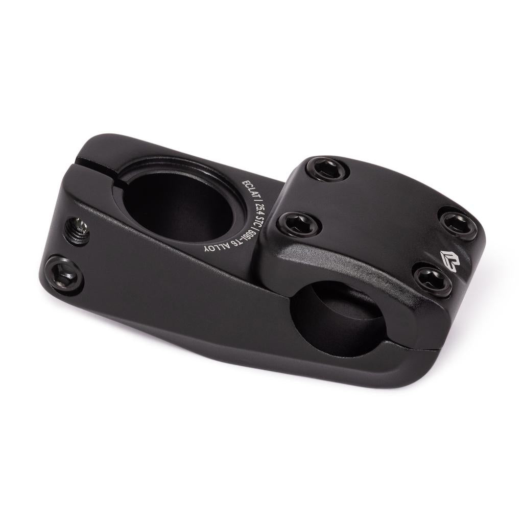 The Eclat Onyx OS Stem (25.4mm Clamp) is a black metal BMX front-load stem with oversized 25.4mm clamping, four top bolt holes, and two circular openings for handlebar and fork attachment.