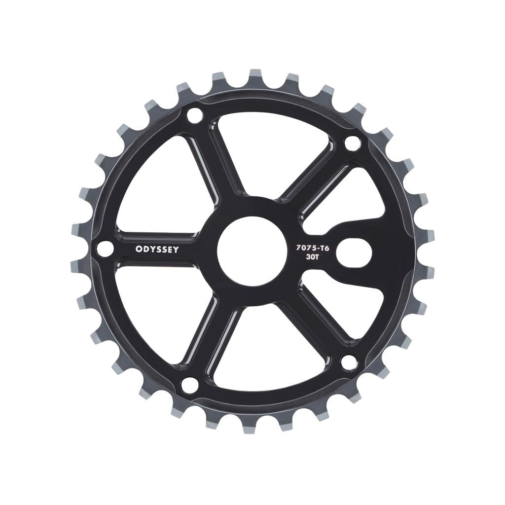Odyssey Utility Pro Guard Sprocket: black metal BMX sprocket with 25 teeth, six spokes, "Odyssey 7075-T6 30T" printed on it; compatible with freestyle BMX chains and shown on a white background.