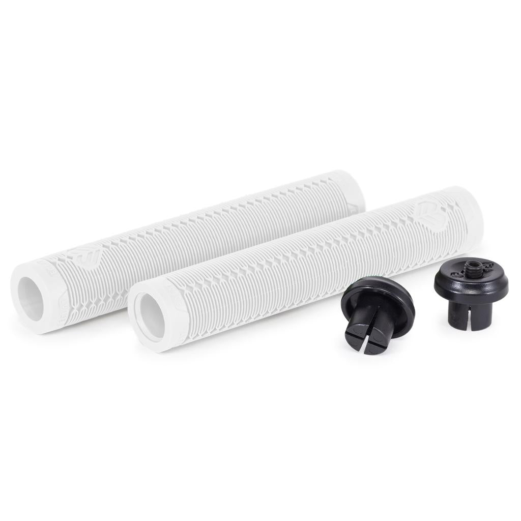 Two white Eclat Shogun Grips with a flangeless design are displayed beside two black end caps, all set against a white background.