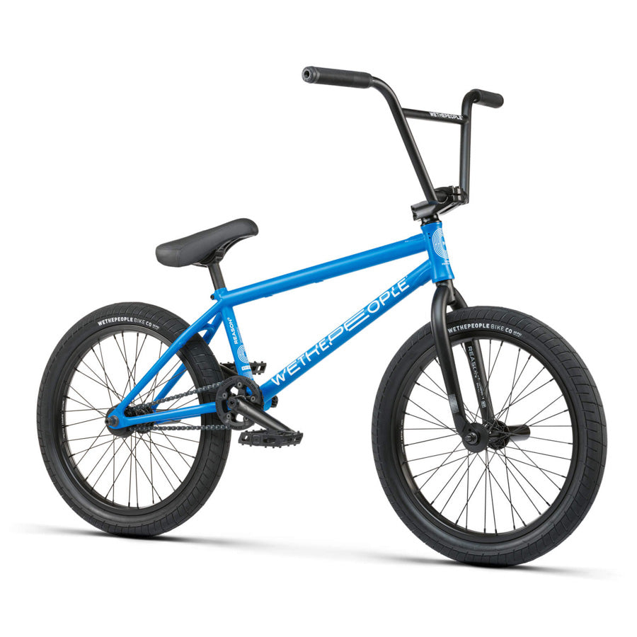 A blue Wethepeople Reason 20 Inch BMX Bike on a white background.