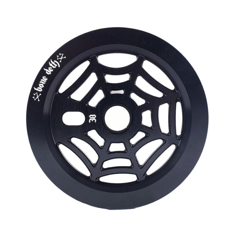 The Bone Deth Webslinger Sprocket, with its spider web cutout and engraved text and symbols around the edge, is a striking and durable addition to any bike.