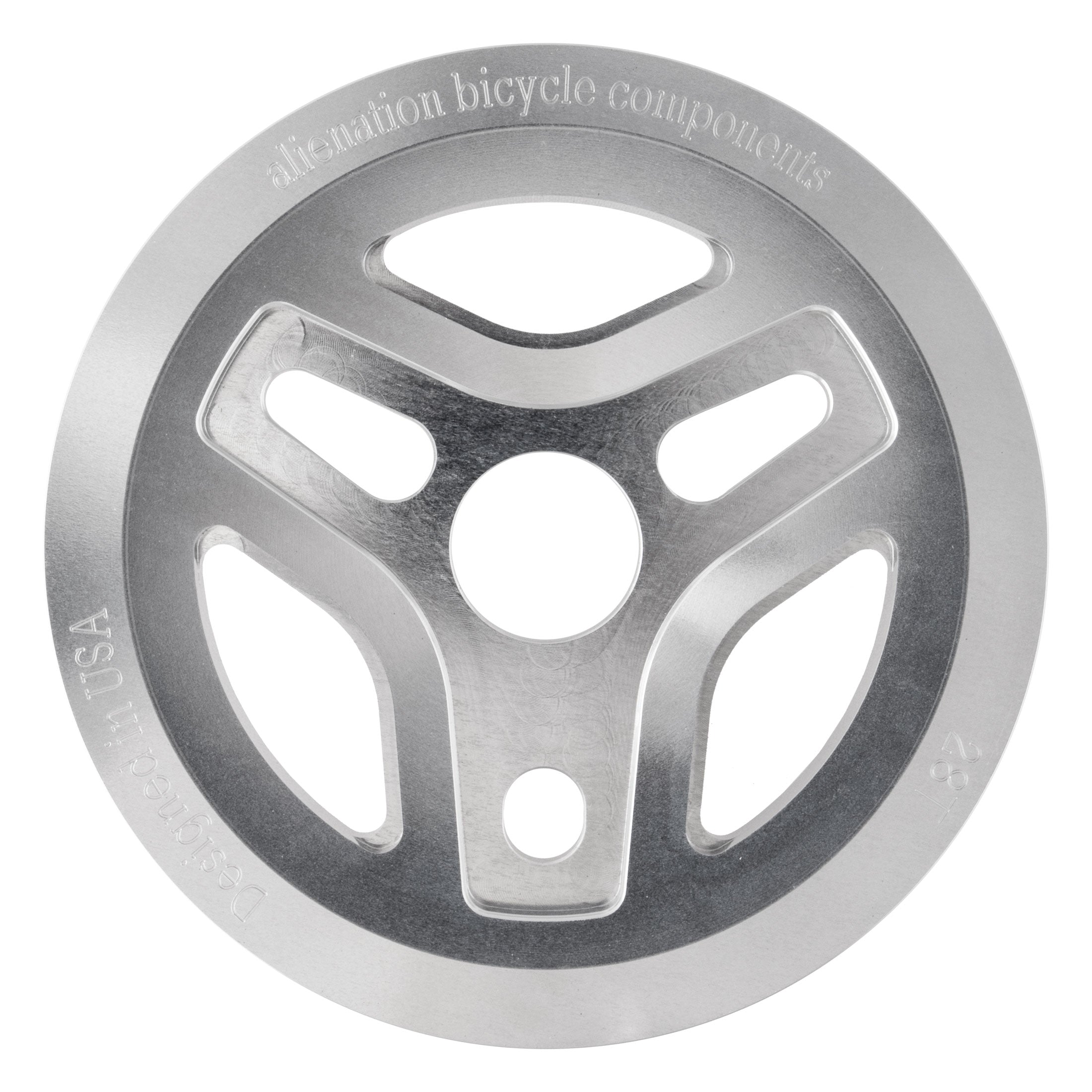 The Alienation Starship Guard Sprocket is a circular metallic bicycle component with three spokes, CNC machined from 7075 aluminum, and features "all-nation bicycle components" and "Designed in USA" engraved on its surface.