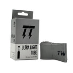 The Twitch Lightweight Tube (24 x 1.5 Inch), shown folded next to its packaging, is ultra-light to reduce rotational weight and boost bike acceleration for a smoother, faster BMX ride.