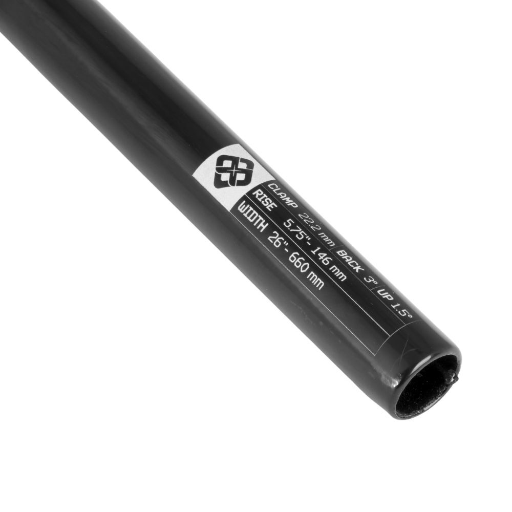 A close-up of the Pride 373 Blanc Replica Alloy Bar BMX handlebar, black and cylindrical, with a label displaying clamp size, rise, width, and specs, highlighting its durable Replica Alloy Bar construction.