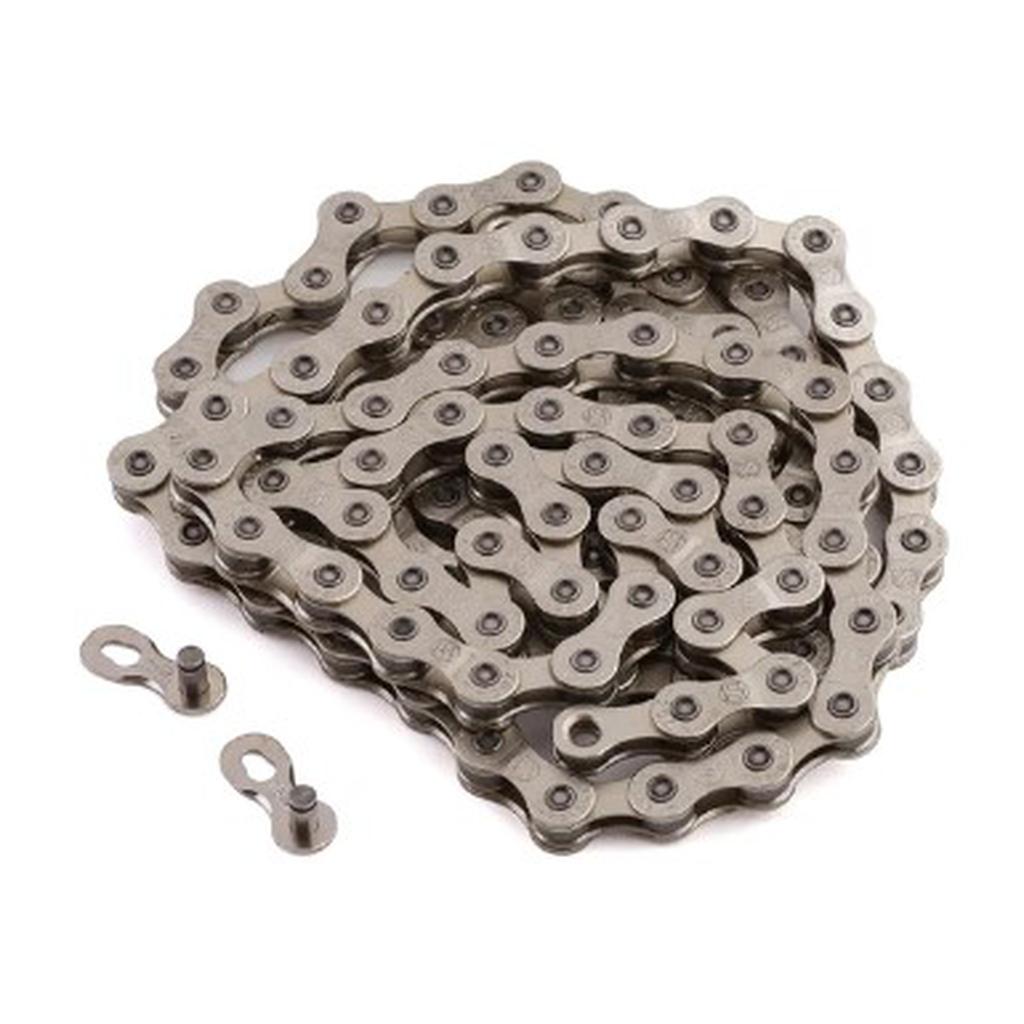 The MCS Professional Chain (1/2 x 3/32 Inch) is coiled on a white surface with included connectors and pins—perfect for riders needing a reliable, pro-level BMX chain.