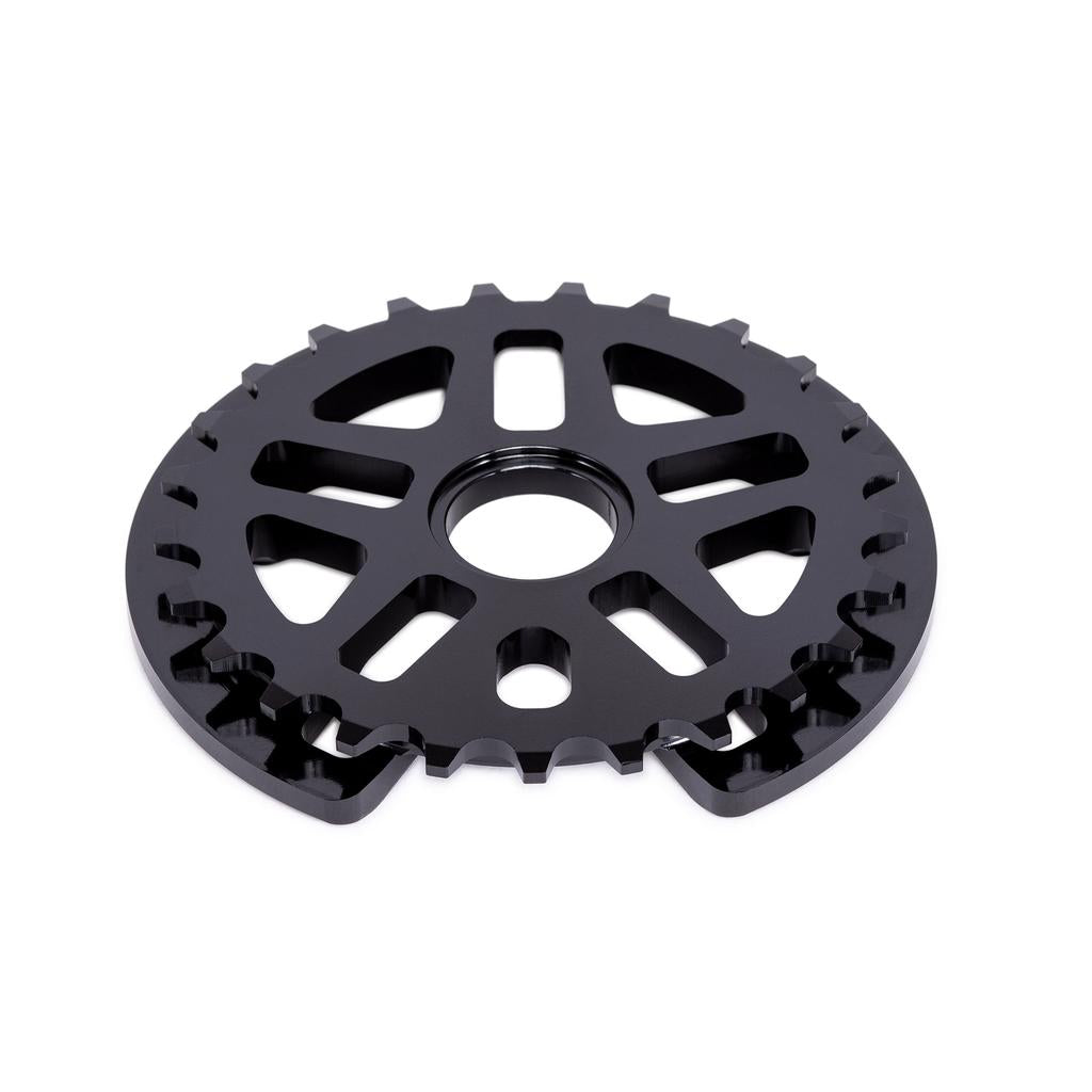A black Eclat Abyss Guard Sprocket, made from strong 7075-T6 alloy with a central hole and multiple cutouts, is photographed on a white background.